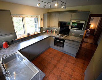 modern kitchen with oven hob microwave kettle toaster at our Waternish Self Catering Accommodation
