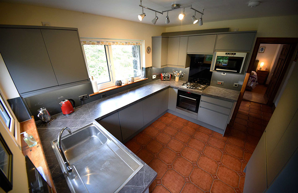 modern kitchen with oven hob microwave kettle toaster at our Waternish Self Catering Accommodation