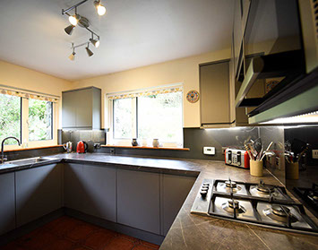 Auld Orwell Cottage kitchen contains oven hob miceowave dishwasher and washing machine