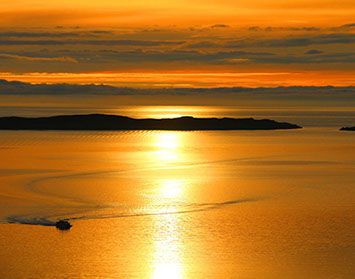 Glas Eilean View Dornie Self Catering contains a modern kitchen with Fridge and Microwave Toaster Kettle and Nespresso coffee machine 